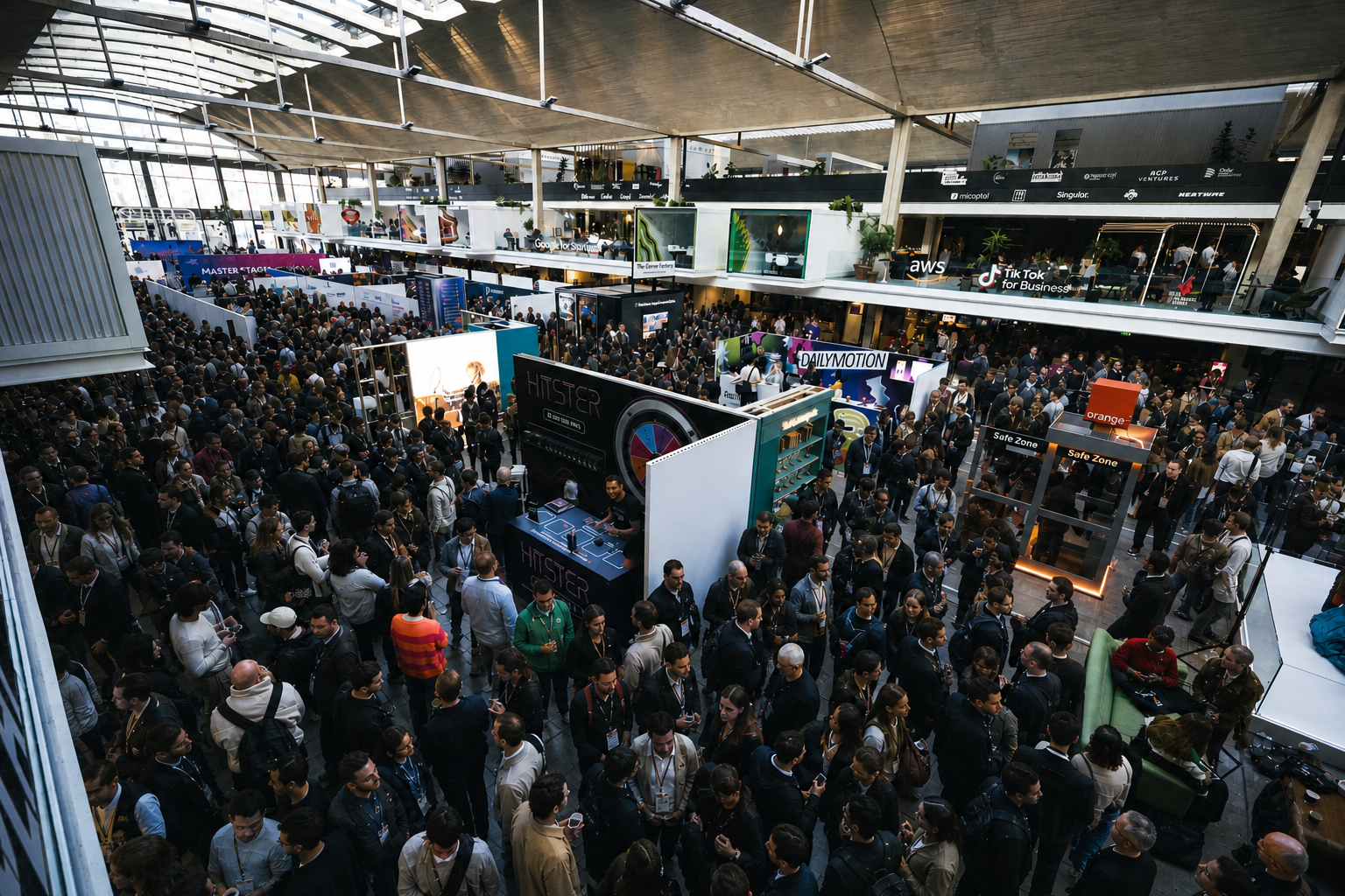 Aerial view of the venue with attendees flowing between the stands